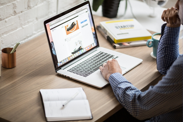 man editing the about us page for client